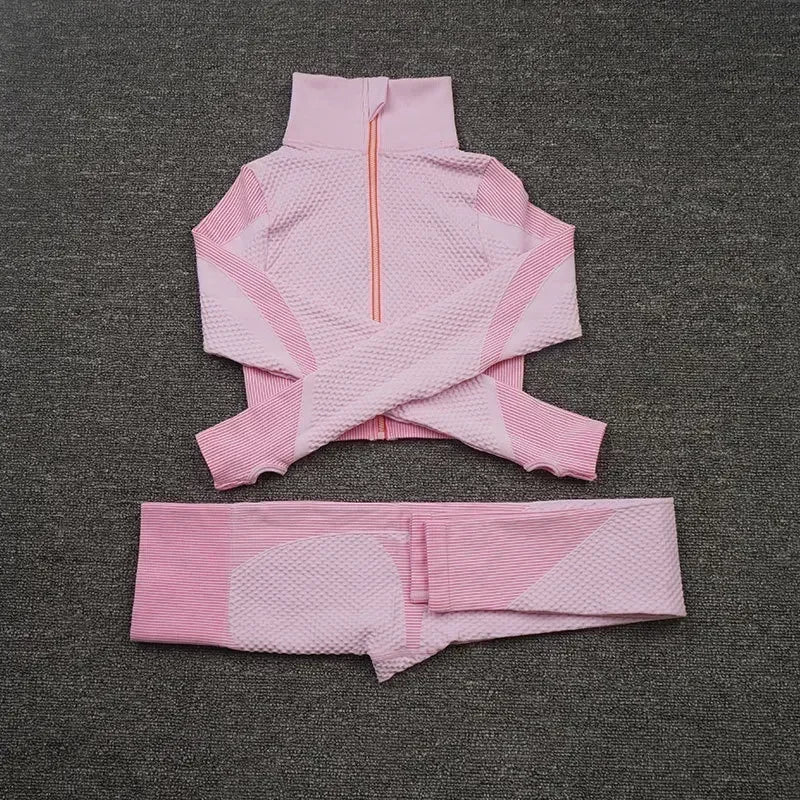Pink mesh sports crop top and leggings set designed for breathable comfort during workouts.