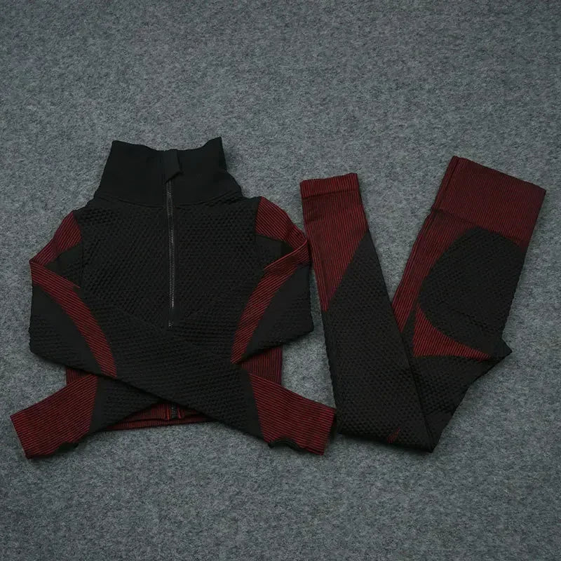 Mesh sports crop top and leggings in black and red, perfect for breathable workouts and stylish athleisure looks for women.