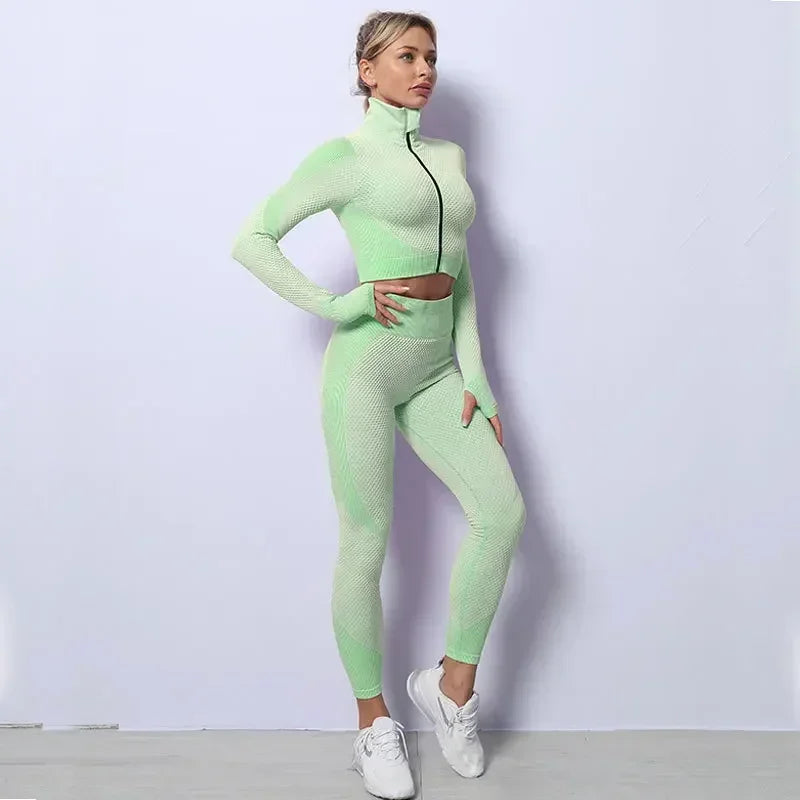 Woman in light green mesh sports crop top and leggings, showcasing breathable workout fashion for yoga and gym.