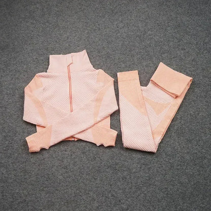 Mesh sports crop top and leggings set in pastel pink, perfect for women's workouts and athleisure wear.