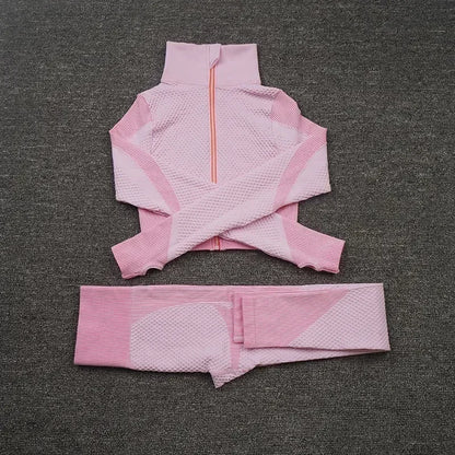 Pink mesh sports crop top and leggings set designed for breathable comfort during workouts.