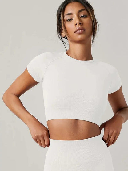 VivaCore Seamless Tee in white, women's breathable crop shirt designed for yoga and quick drying performance.
