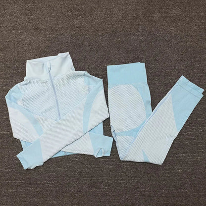 Light blue mesh sports crop top and leggings set for women, ideal for workouts and athleisure wear.